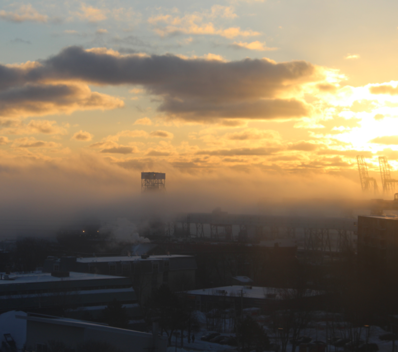 Photo of Halifax Harbour enshrouded by clouds.